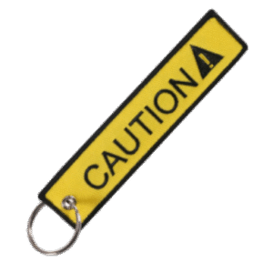 Llavero "Caution" Amarillo